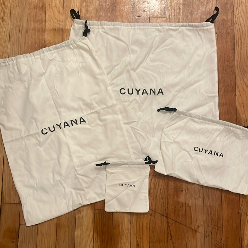 Lot of 4 Cuyana dust bags. Various sizes.
